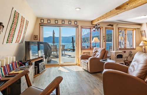 Bayview House | Incredible lakefront floating home with mountain views, balcony, & gas fireplace