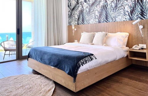 Kfardebian House | Indigo Jungle: Beachfront Exotic Room in Batroun