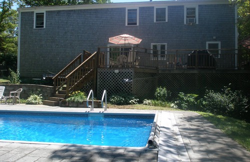 Mashpee House | Inground Pool with patio, large deck, ship playhouse and swing