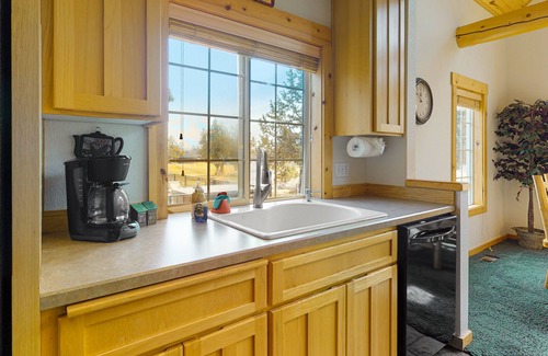 Redmond Ski Chalet | Inviting chalet with private hot tub, grill, 3 pools, hot tub, gym, & tennis