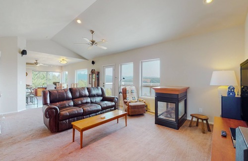Union House | Inviting home with hot tub, water view, fireplace, pool table, & W/D
