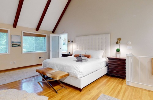 Lake Grove House | Inviting home with enclosed yard, firepit, hot tub, hammock, washer/dryer