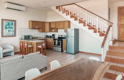 Playa Hermosa Apartment | Inviting ocean-view condo near the beach with pools, scenic balcony, & WiFi