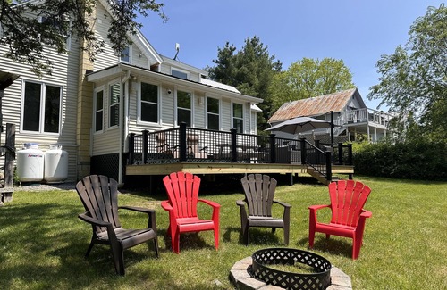 Montgomery Center House | Inviting riverfront home with hot tub on deck & fireplace, near skiing & golf