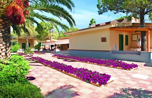 Santa Maria del Cedro House | Bungalows surrounded by greenery a stone's throw from the sea