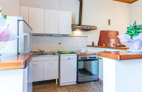 Rosignano Marittimo Villa | Lovely apartment in villa for 17 guests with pool, TV and pets allowed