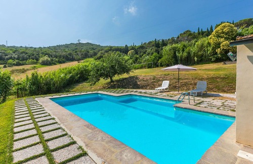 Rosignano Marittimo Villa | Lovely apartment in villa for 17 guests with pool, TV and pets allowed