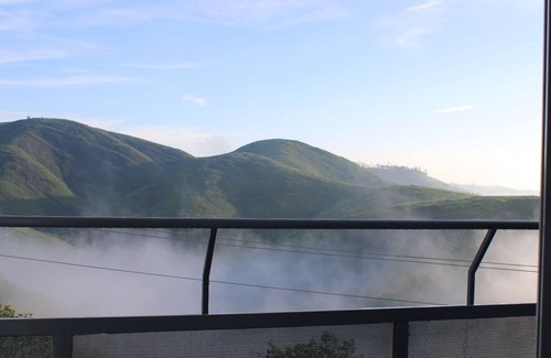 Pirmed Villa | IZZAT INN Villa, Parunthumpara, A pet friendly mountien view villa.