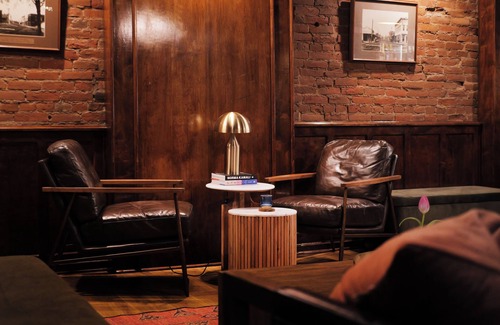 Jacksonville Hotel | Jacksonville Inn Room #8: King Suite. Prime downtown location for festivals and dining. Comfortable king bed, Nespresso coffee, and historic boutique elegance