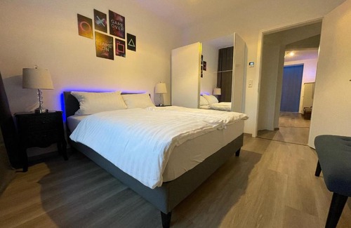 Dortmund Apartment | JayBnB - PS5 55 Zoll 4K TV Gaming Apartment