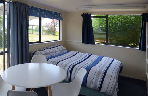 Karitane Apartment | Karitane absolute-seaside self-contained family holiday studio, 2 adults, 2 kids
