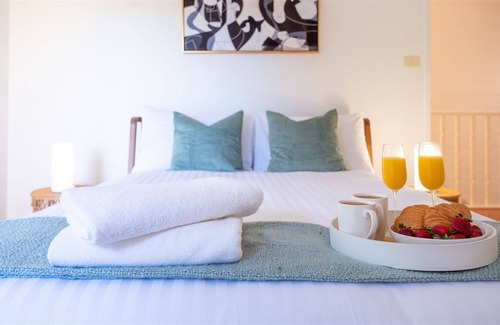 Kiama Villa | Kiama Haven - stunning views of Easts Beach, the ocean and the hills of the Kiama Coastal Walk.