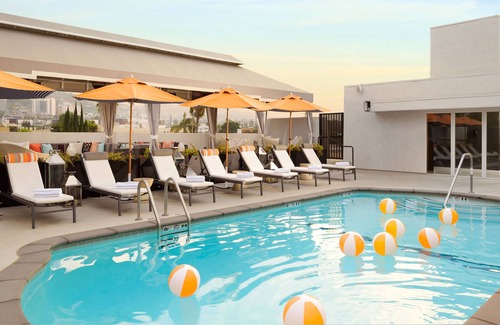 Tri-West House | King Suite + Balcony | Pool, Bar, Cabanas | Bikes