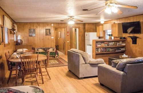 Triumph Cabin | Kishauwau's Starved Rock Area Cabins - Single Bedroom Trading Post Cabin