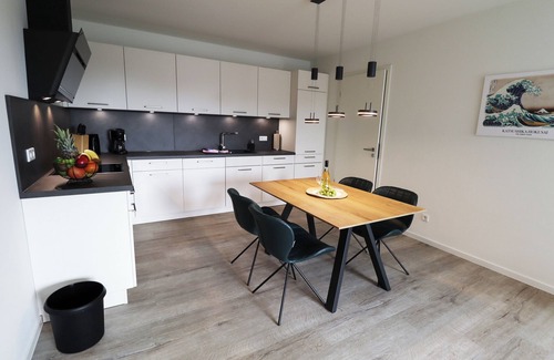 Tossens Apartment | KÜSTE33/44 - Balcony. Sauna. Allergy friendly.