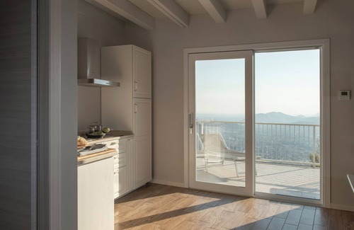 Villanuova sul Clisi Apartment | La Cornice sul Garda- Sottobosco- terrace and lake view in residence with pool
