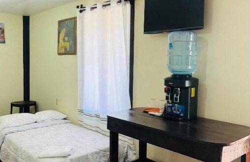 Corozal Hotel | La Delphina Bed and Breakfast Bar and Grill Deluxe Family Room