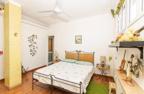 Bullona Apartment | La Milano Design '50s with Botanical Terrace