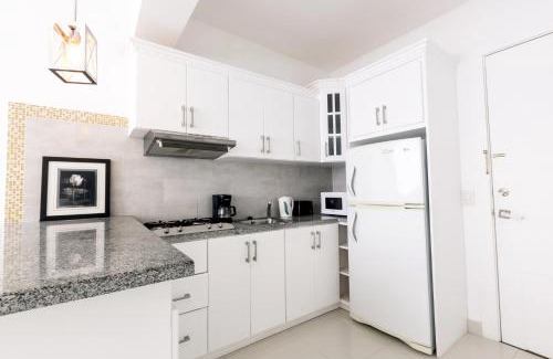 Bavaro Apartment | LA PERLA STUDIOS with ROOFTOP POOL and SPA - PLAYA LOS CORALES