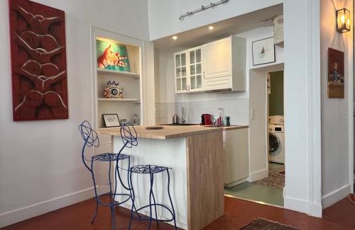 Ecusson Apartment | LA SUITE - Appartement Centre Historique