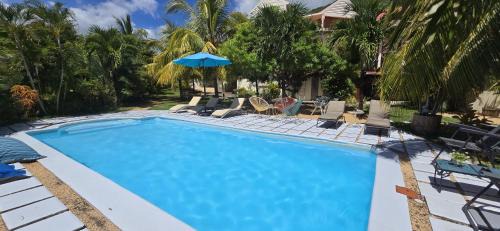 Tamarin Apartment | LAKAZ DEL SOL - Elegant apartments with luxurious garden, pool and barbecue area - Tourism Permit Certified