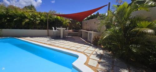 Tamarin Apartment | LAKAZ DEL SOL - Elegant apartments with luxurious garden, pool and barbecue area - Tourism Permit Certified