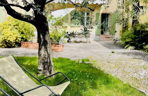 Torbole sul Garda House | Lake Garda: Idyllic villa in quiet village center with olive and palm trees garden