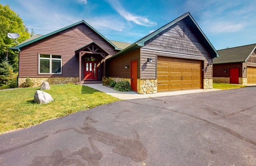 Land O Lakes Condo | Lake-view condo with dock, pool table, grill, deck, patio, wet bar, & streaming