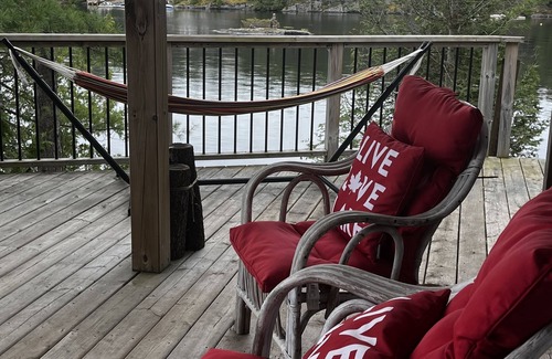 Catchacoma Cottage | Lake view cottage, clean weed free swimming and a hot tub on Mississagua Lake