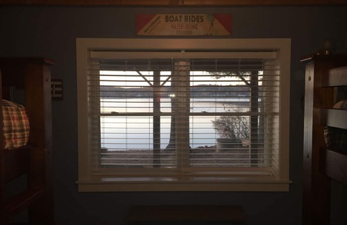 Lochmere House | Lake Winnisquam home with beach and private boat dock. 15 minutes to Gunstock.