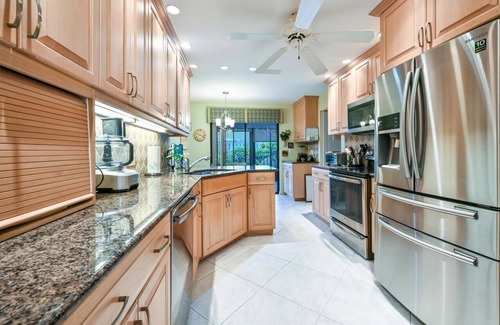 Pelican Bay House | Lakefront 3 bedroom, 2 bath home in gated community. Walking distance to beach.