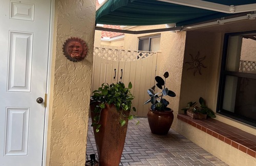 Pelican Bay House | Lakefront 3 bedroom, 2 bath home in gated community. Walking distance to beach.