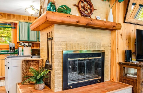 Presque Isle House | Lakefront cabin with dock, kayaks, SUP, wood fireplace, & washer/dryer