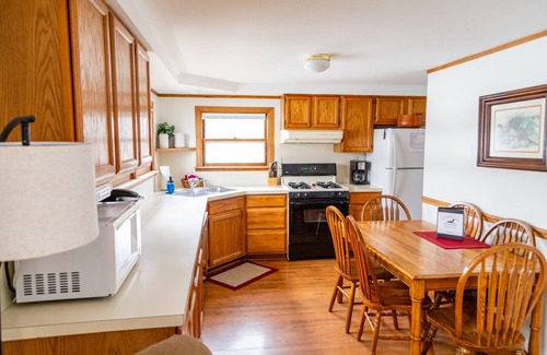West Branch House | Lakefront Home - Two Bedroom with Fireplace - Outdoor Hot Tub - Pet Friendly!