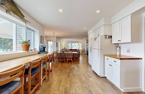 Alden House | Lakefront home w/large yard, sandy beach area, dock, & WIFI, near golf & trails