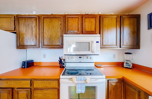 Big Arm House | Lakefront home with private beach, dock, firepit, & grill - dazzling sunset view