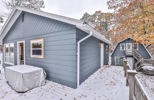 Sayner House | Lakefront home with private dock, deck, fireplace, firepit, canoe & paddleboat