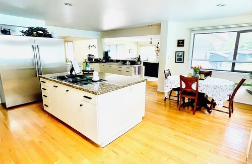 Youbou House | Lakefront home with tennis court & private dock & big back deck & sandy beach
