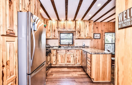 Rhinelander House | Lakefront home with private dock, screened porch, woodstove, fast WiFi, & W/D