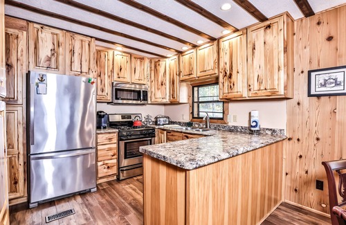Rhinelander House | Lakefront home with private dock, screened porch, woodstove, fast WiFi, & W/D