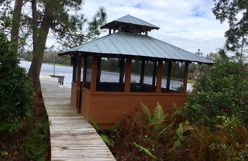 Hawthorne House | Lakefront Log Home, Screened Heated Pool, & Recreation House