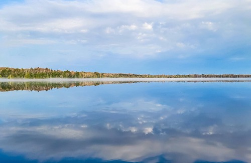 Presque Isle House | Lakefront suite at a vintage resort with communal dock, rowboats & firepit