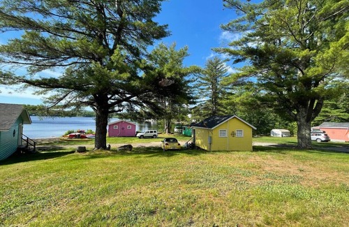 Northwood Cottage | Lakefront Yellow Cottage