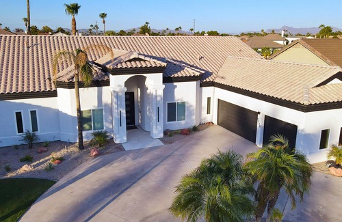 Val Vista Lakes House | Lakeside Luxe: Private Home in Gated Community with Heated Pool, Spa and More!