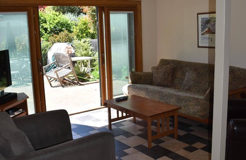North Berkeley House | Large bedroom, bathroom & tenant kitchen, with lounge area and patio