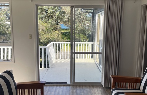 Whangapoua House | Large Cozy Kiwi Bach - 1 minute walk to one of New Zealand’s best beaches