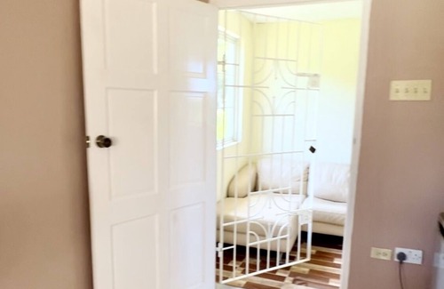 Salt Gut Apartment | Large Deluxe Studio with Balcony 10 minutes drive to Ocho Rios Airport.