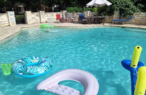 Seguin House | Large Mediterranean pool, river, basketball, sleeps 26, 8 bedrooms