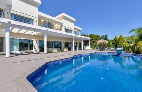 Urbanitzacio la Fustera Villa | Large modern villa with indoor and outdoor pool sauna and bar.
