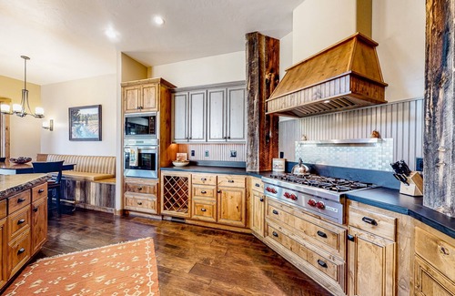McCall House | Large townhome with outdoor kitchen, open-air fireplace & mountain views